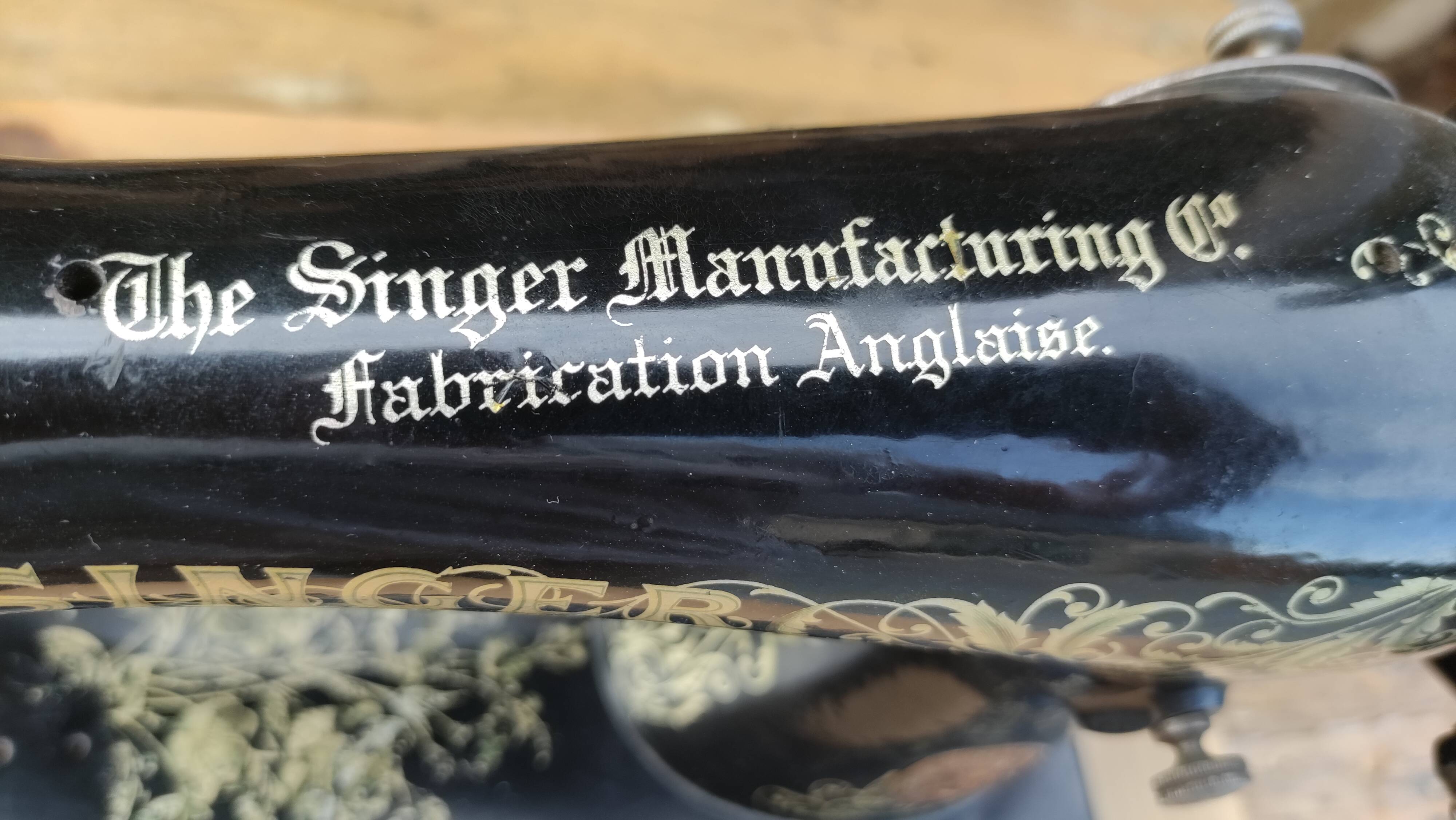 Old Singer sewing machine on pedestal