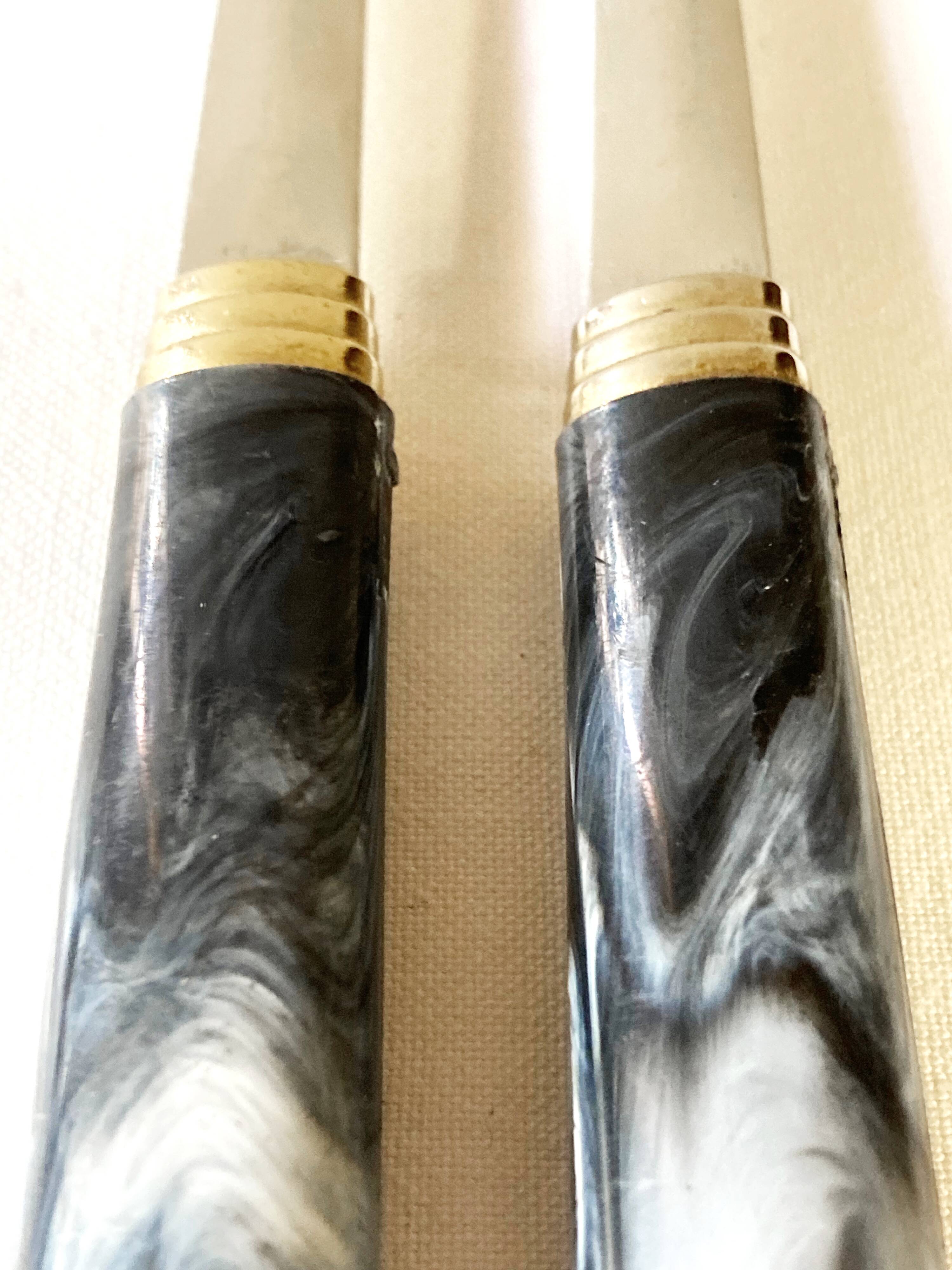 Stainless steel and bakelite serving cutlery, Guy Degrenne