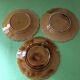 3 slip dessert plates stamped Sarreguemines. Fruit decor.