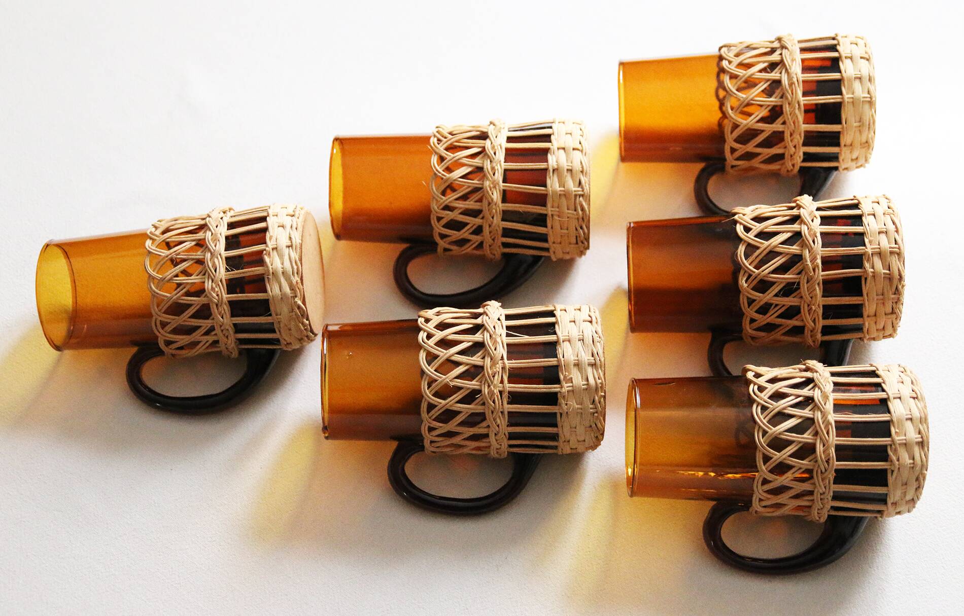 6 amber glasses wrapped in rattan Circa 60/70 Vintage