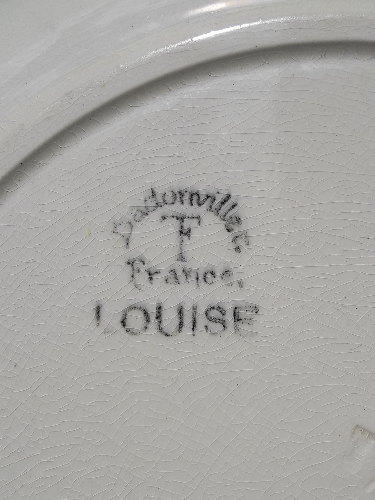 Plat rond creux en faïence de Badonviller modèle Louise diam 27 cm