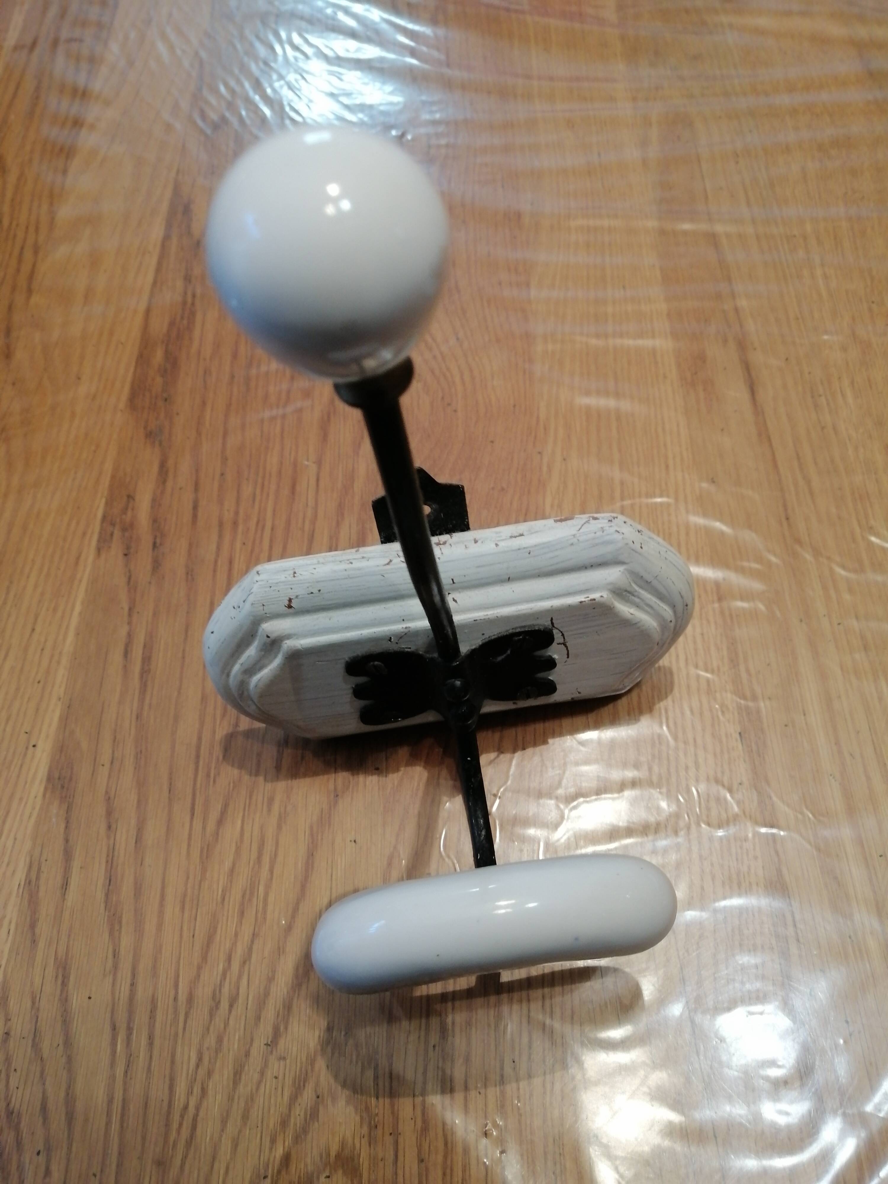 2 vintage wooden and ceramic coat hooks