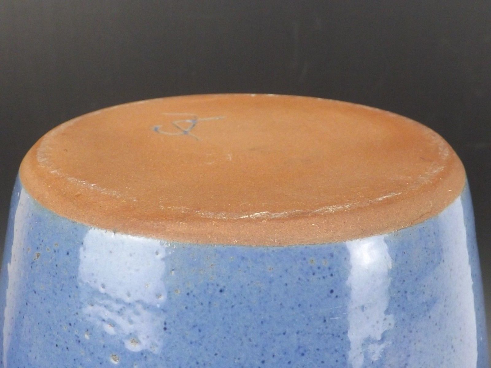 Signed enamelled terracotta bottle vase