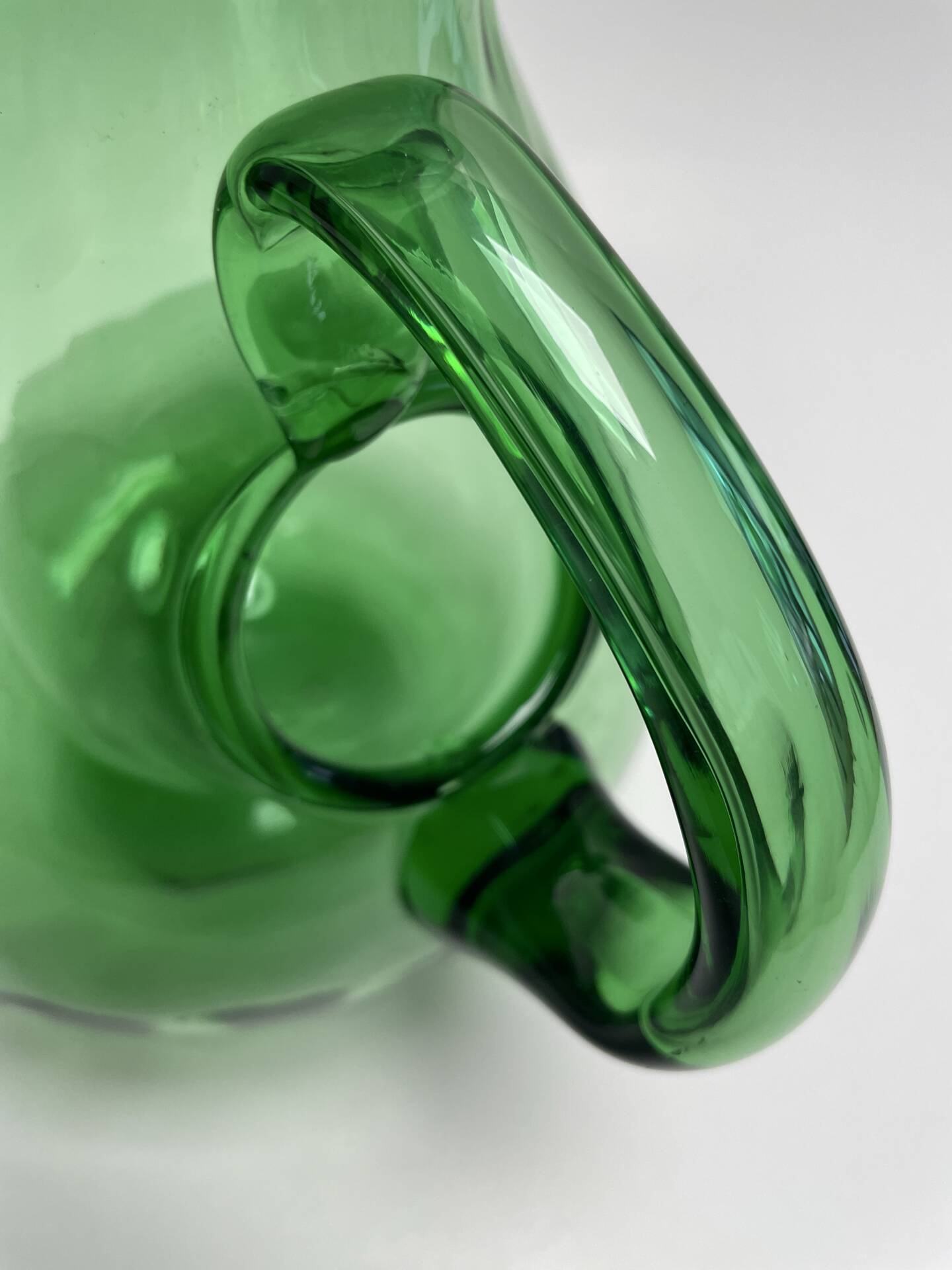 Large green glass cooling jug