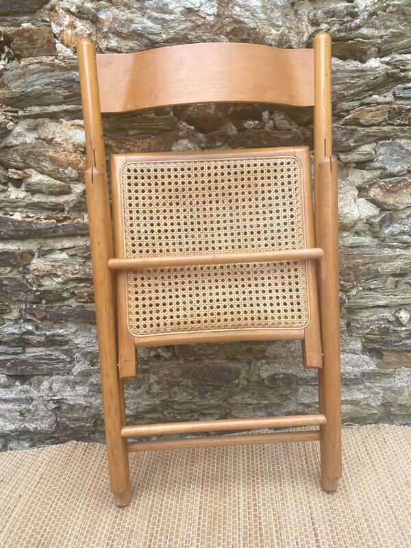Chaise pliante en bois et cannage années 80