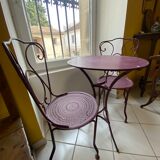 Set of two chairs and wrought iron pedestal table
