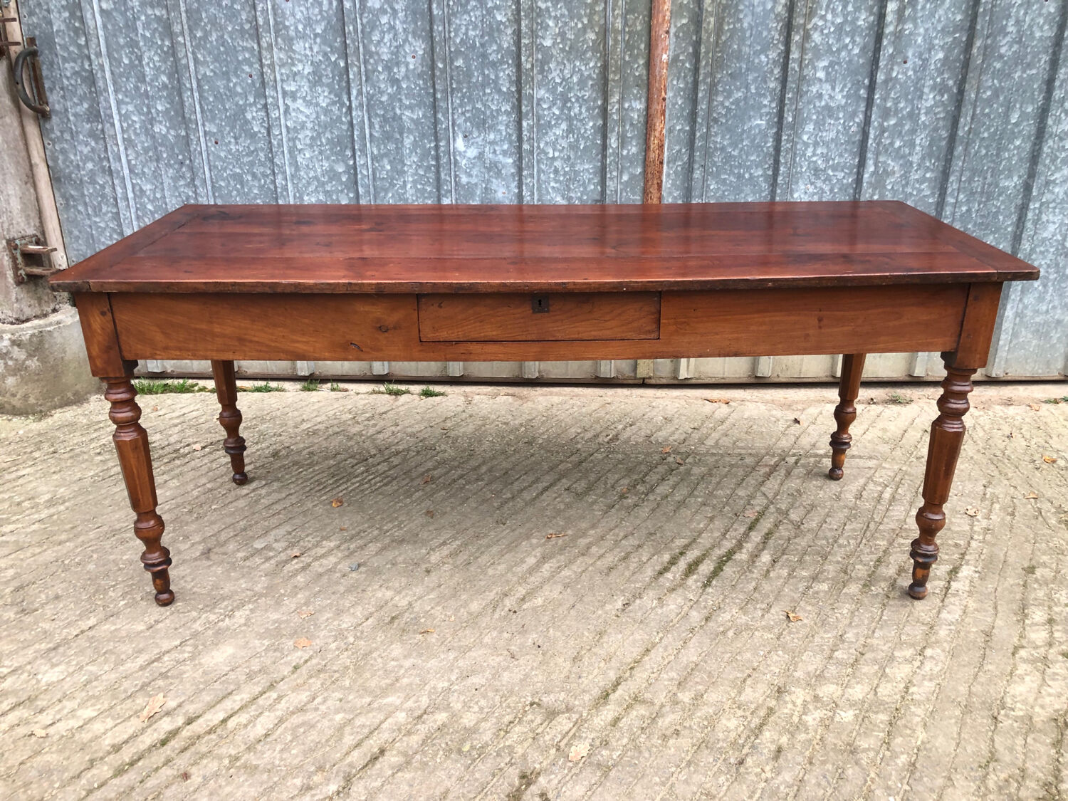 Antique farmhouse table in solid cherry wood with 4 drawers