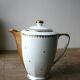 White and gold Limoges porcelain teapot