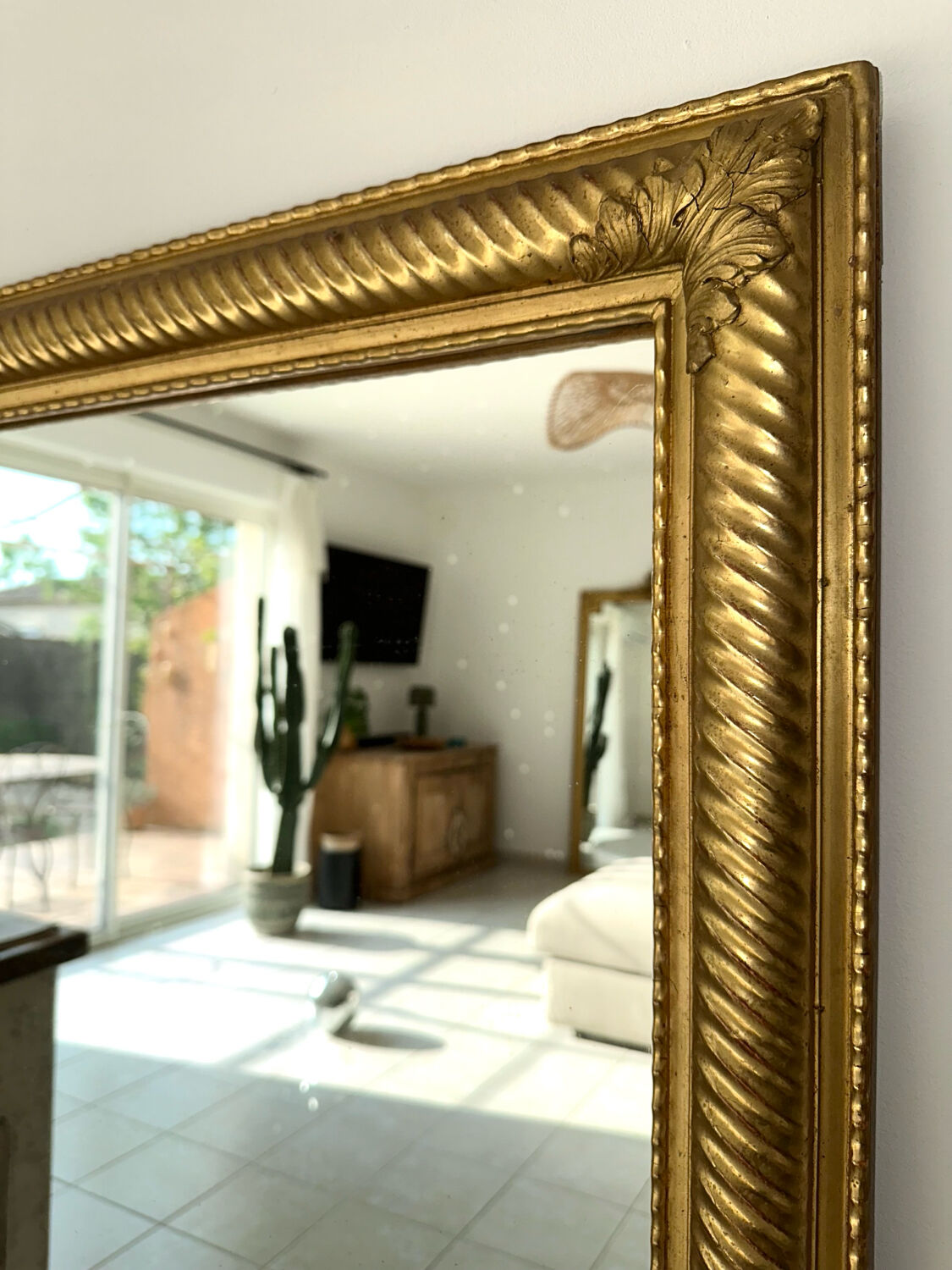 19th-century antique gilded mirror.