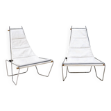 A pair of low chairs. France 70s