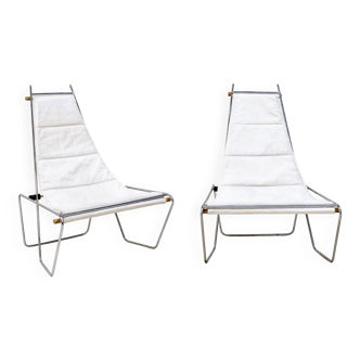 A pair of low chairs. France 70s
