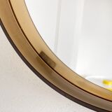 Space age round mirror with a smoked acrylic border