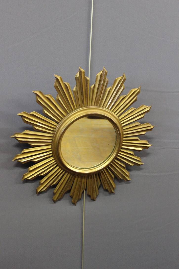 Sun mirror in gilded wood circa 1970
