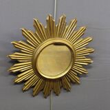 Sun mirror in gilded wood circa 1970