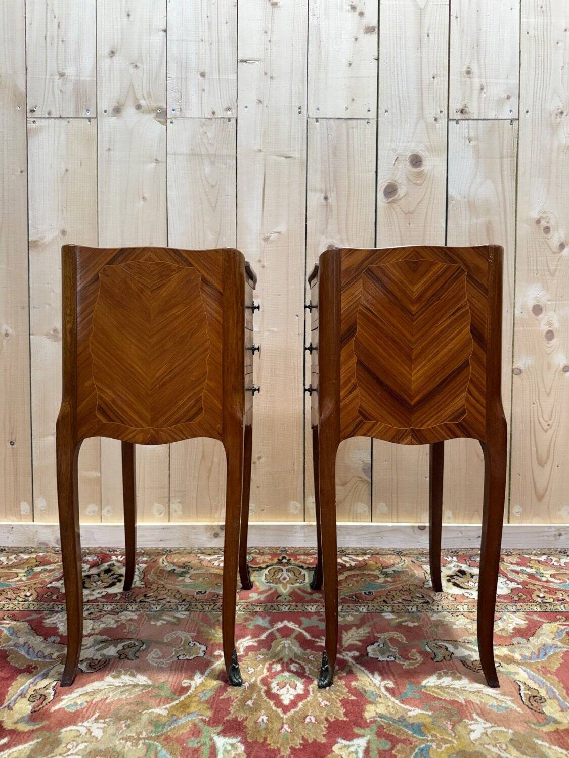 Pair of Louis XV style bedside tables in marquetry.