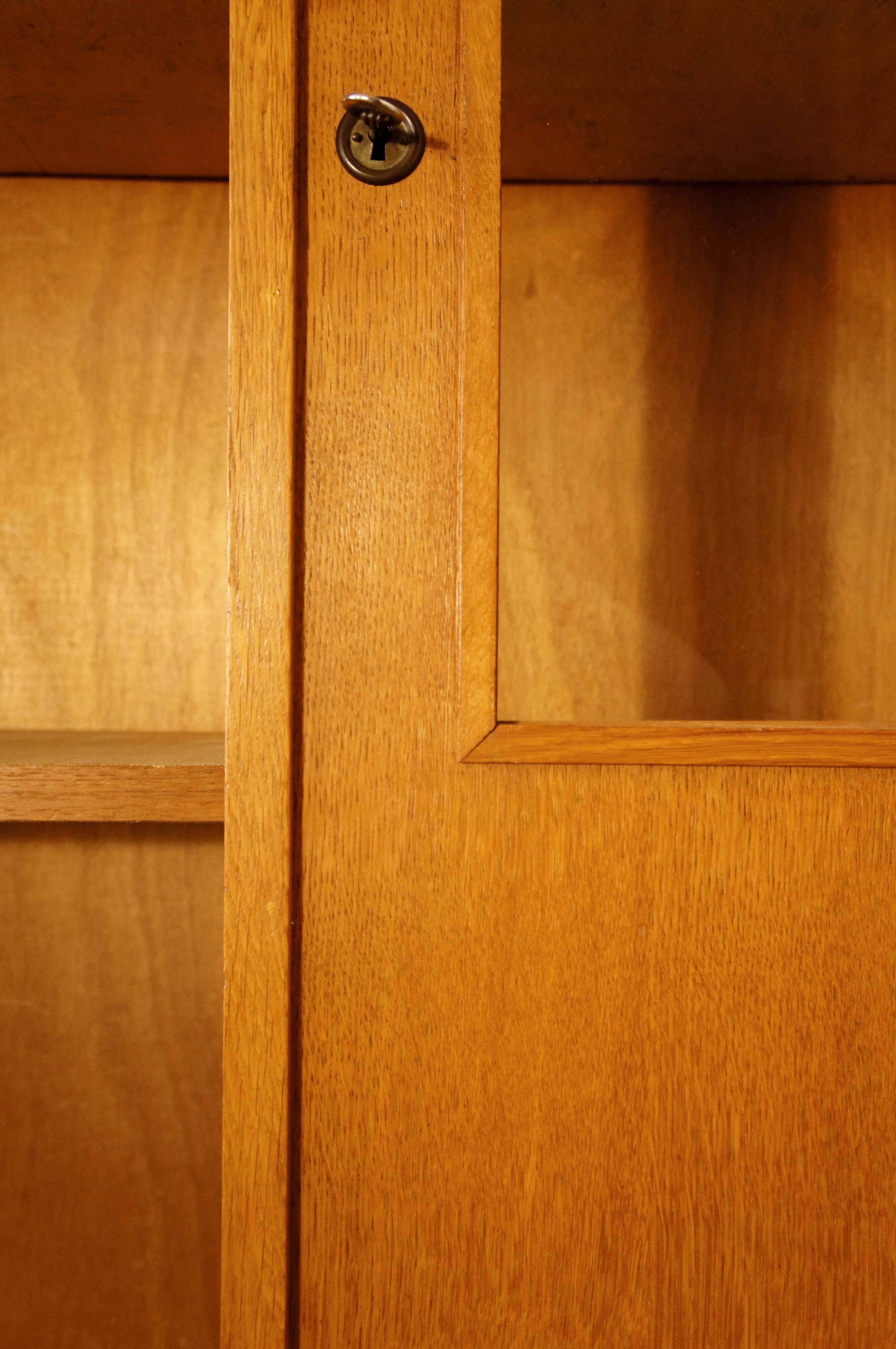 Modernist glass library in blond wood 1960