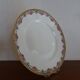 4 assiettes plates porcelaine Limoges Theodore Haviland motifs Art Deco Ø 24, cm