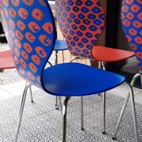 Blue and terracotta ant chairs with eye pattern