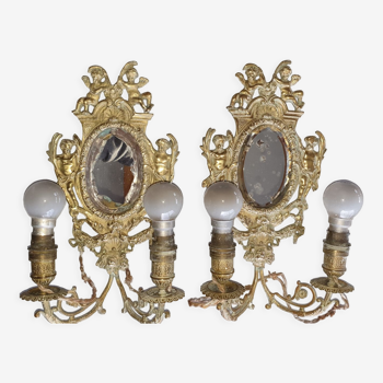 Pair of gilded bronze sconces with Louis XV style mirror