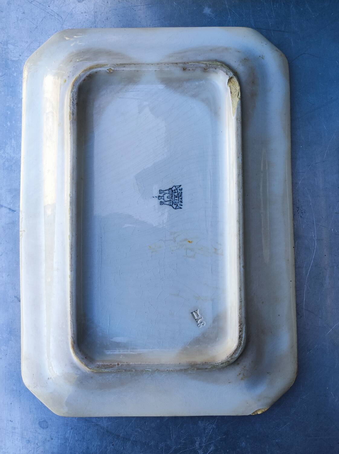 2 old earthenware dishes, one from Gien