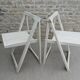 Pair of folding wooden chairs, white patina, circa 1960.