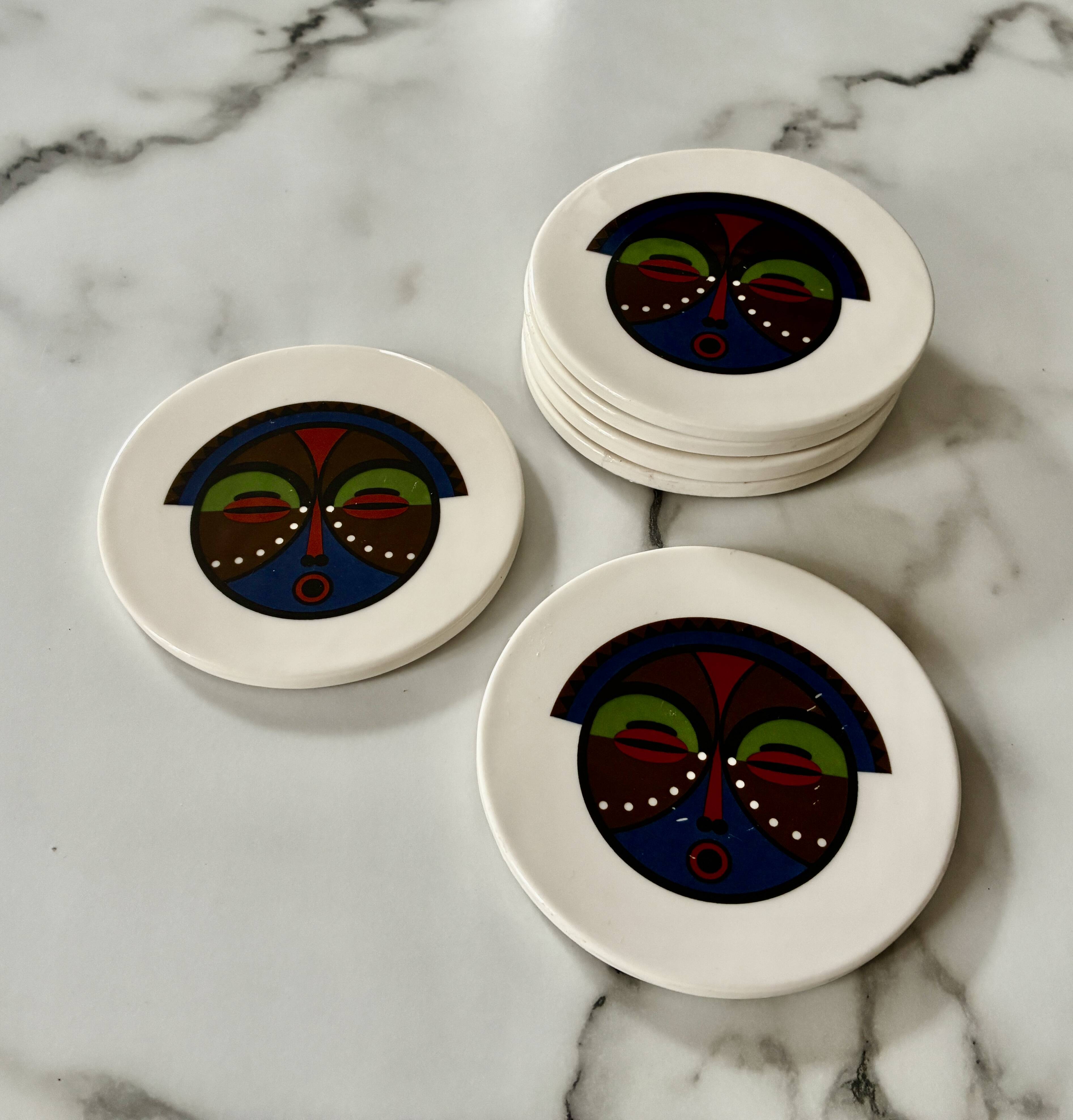 Lot of 6 ethnic ceramic coasters with tribal masks.