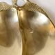 Brass catchall in the shape of an apple.