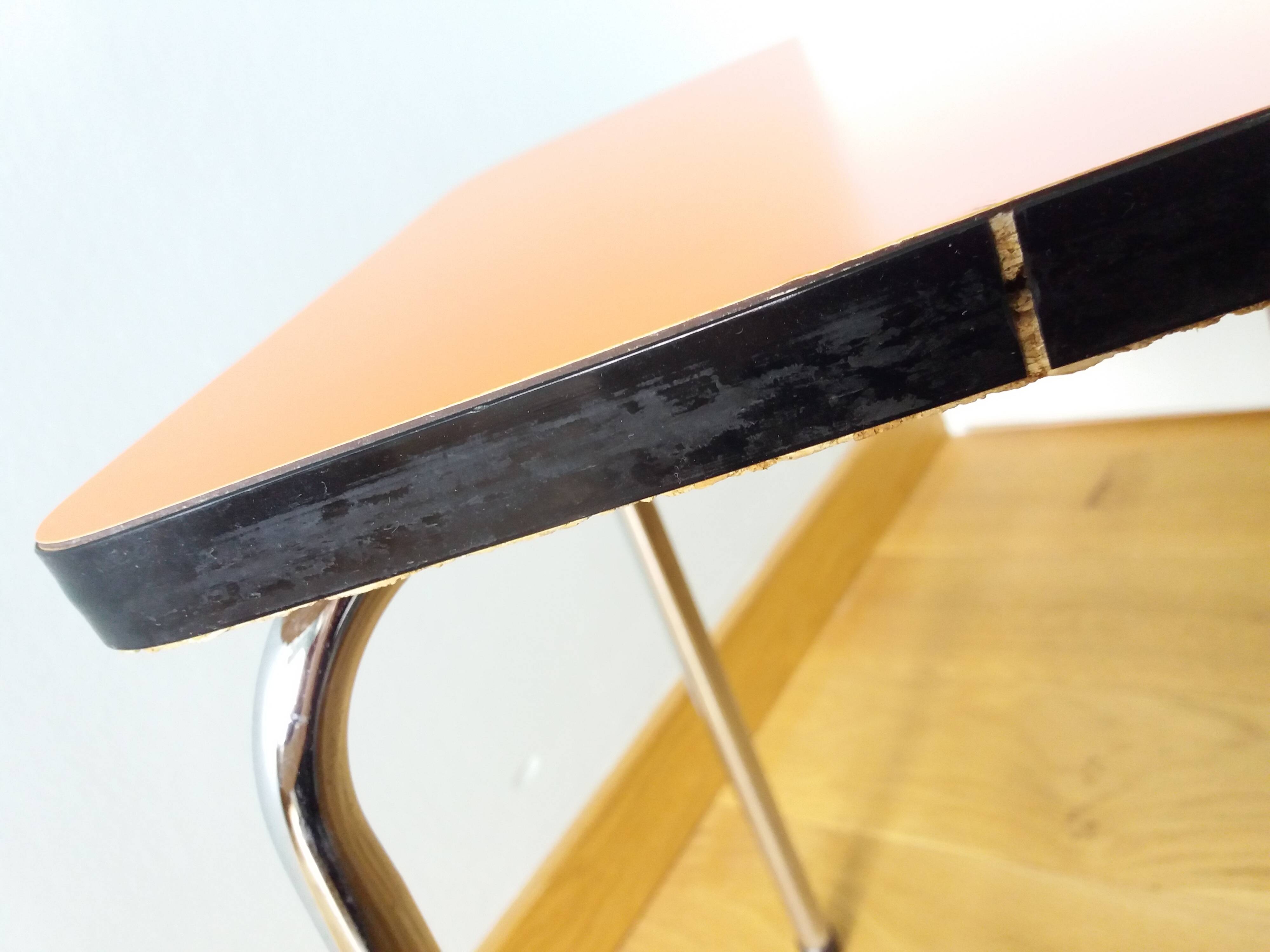 Chrome metal and orange formica stool