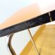 Chrome metal and orange formica stool