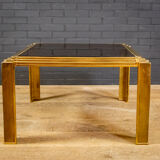 Table basse en laiton et verre.