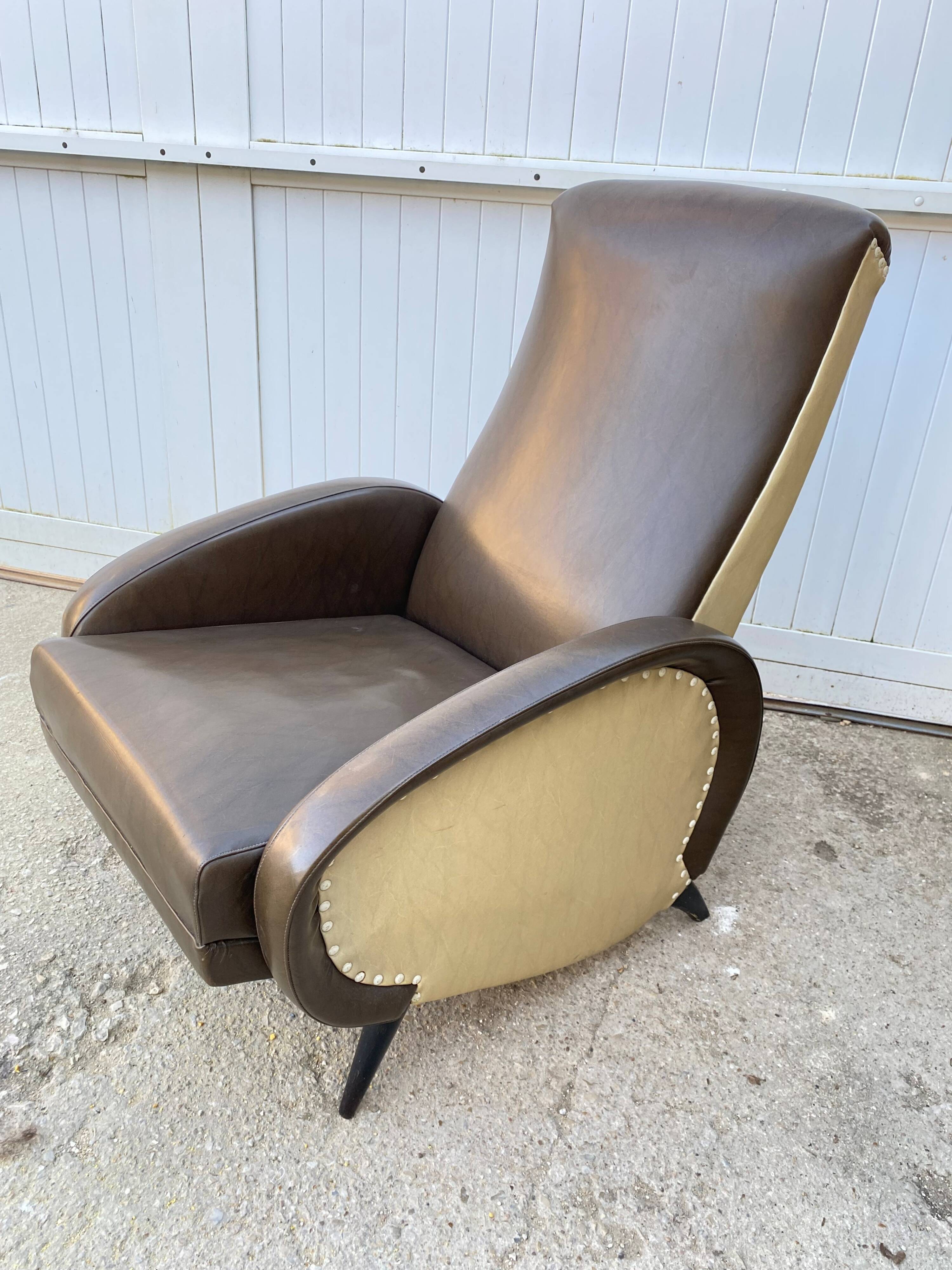 Vintage 50 faux leather reclining lounge chair with footrest