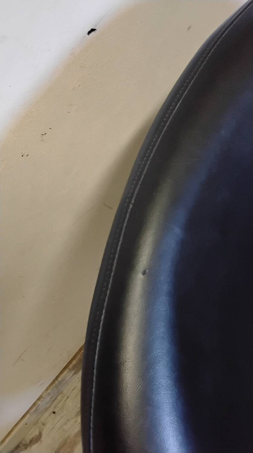 70s style swivel armchair