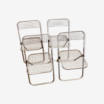 4 chrome folding chairs by Talin Cornedo