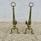 Pair of Neo-classical andirons, in solid bronze, 1920s-1930s.