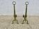 Pair of Neo-classical andirons, in solid bronze, 1920s-1930s.