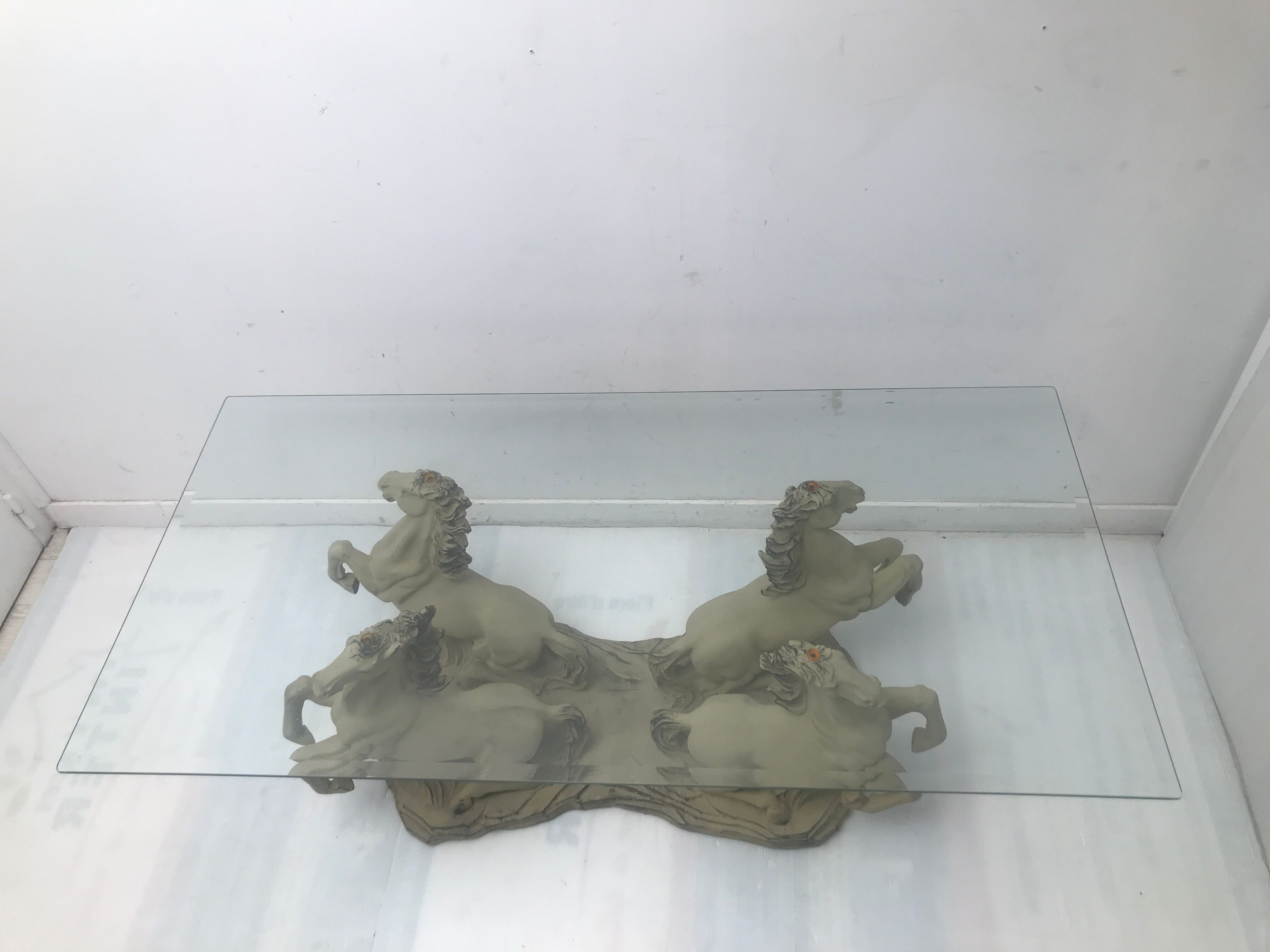 Coffee table glass top on 4 vintage horses