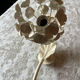 Ecru metal flower wall sconce