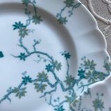 12 Haviland Limoges dessert plates.