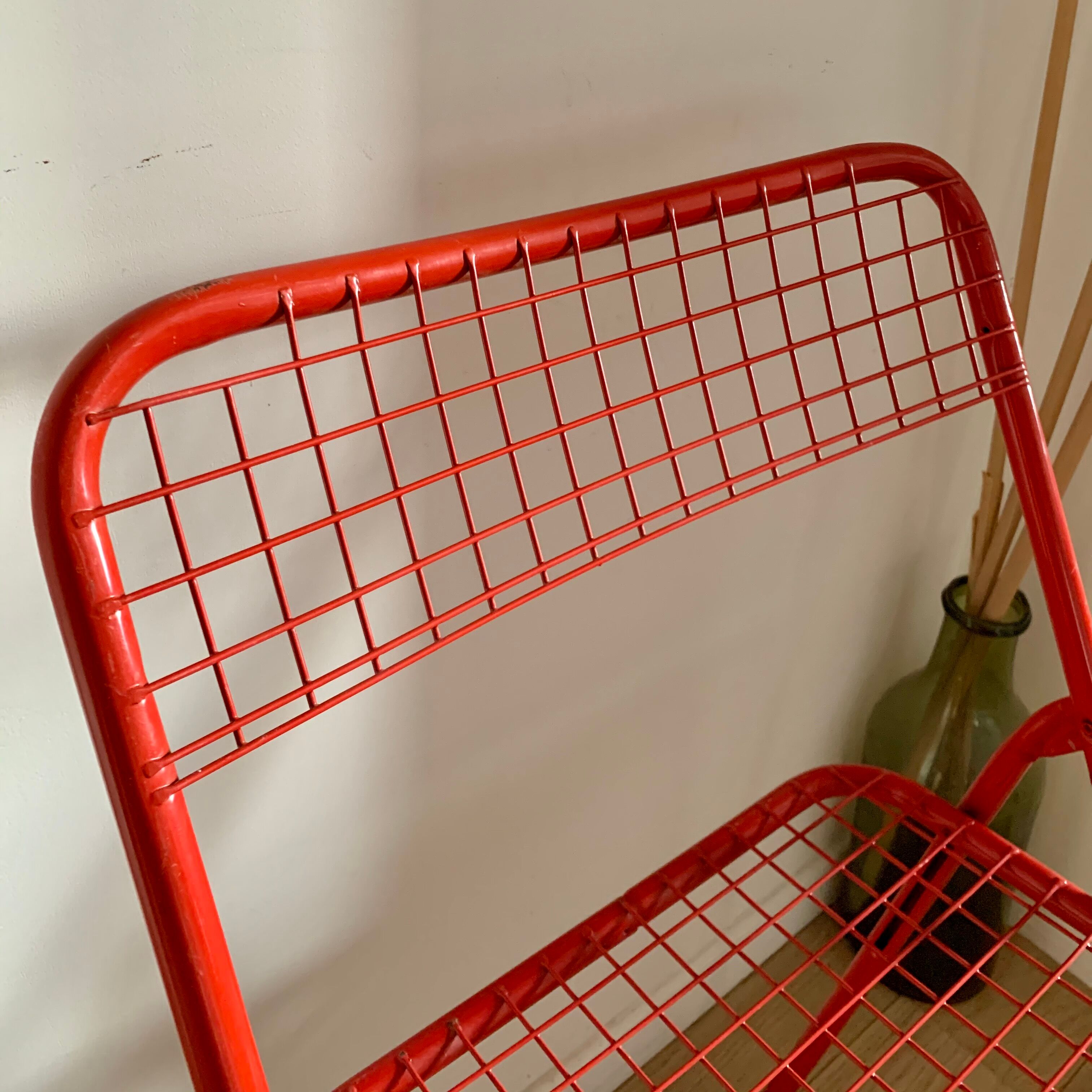 Red folding chair mesh metal