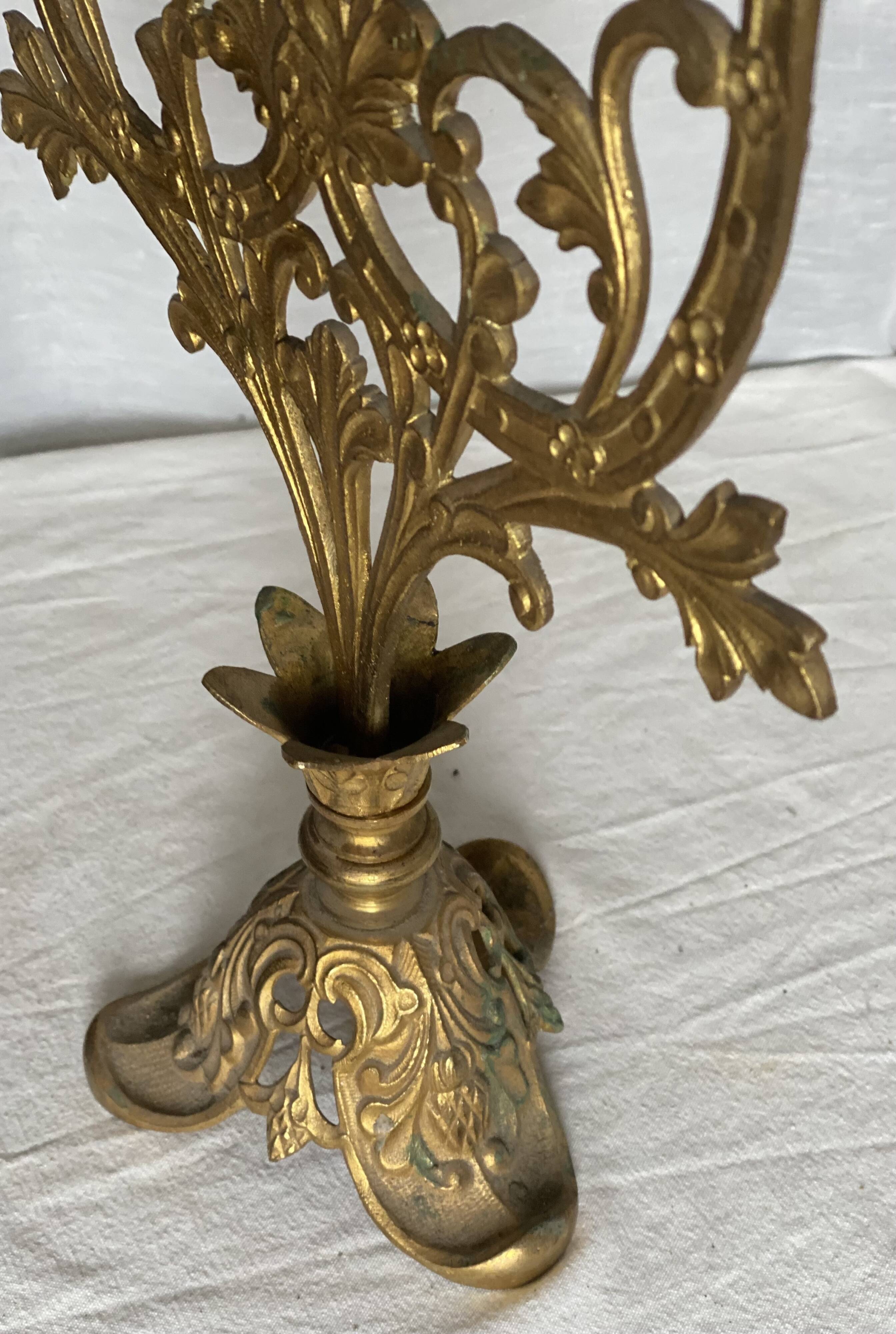 Set of 3 gilt metal candlesticks from the early 20th century.