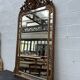19th-century mirror with cherubs