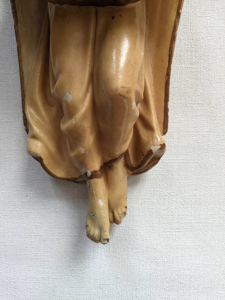 Antique ceramic holy water font with winged angel, religious object, country decoration