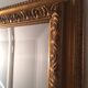 Bevelled mirror with gold frame 49x68cm