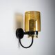 Pair of black metal wall lamps with yellow shades and inner diffuser