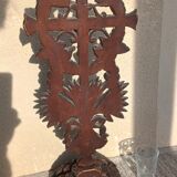 Antique wooden crucifix carved from the Black Forest with grapes and leaves.