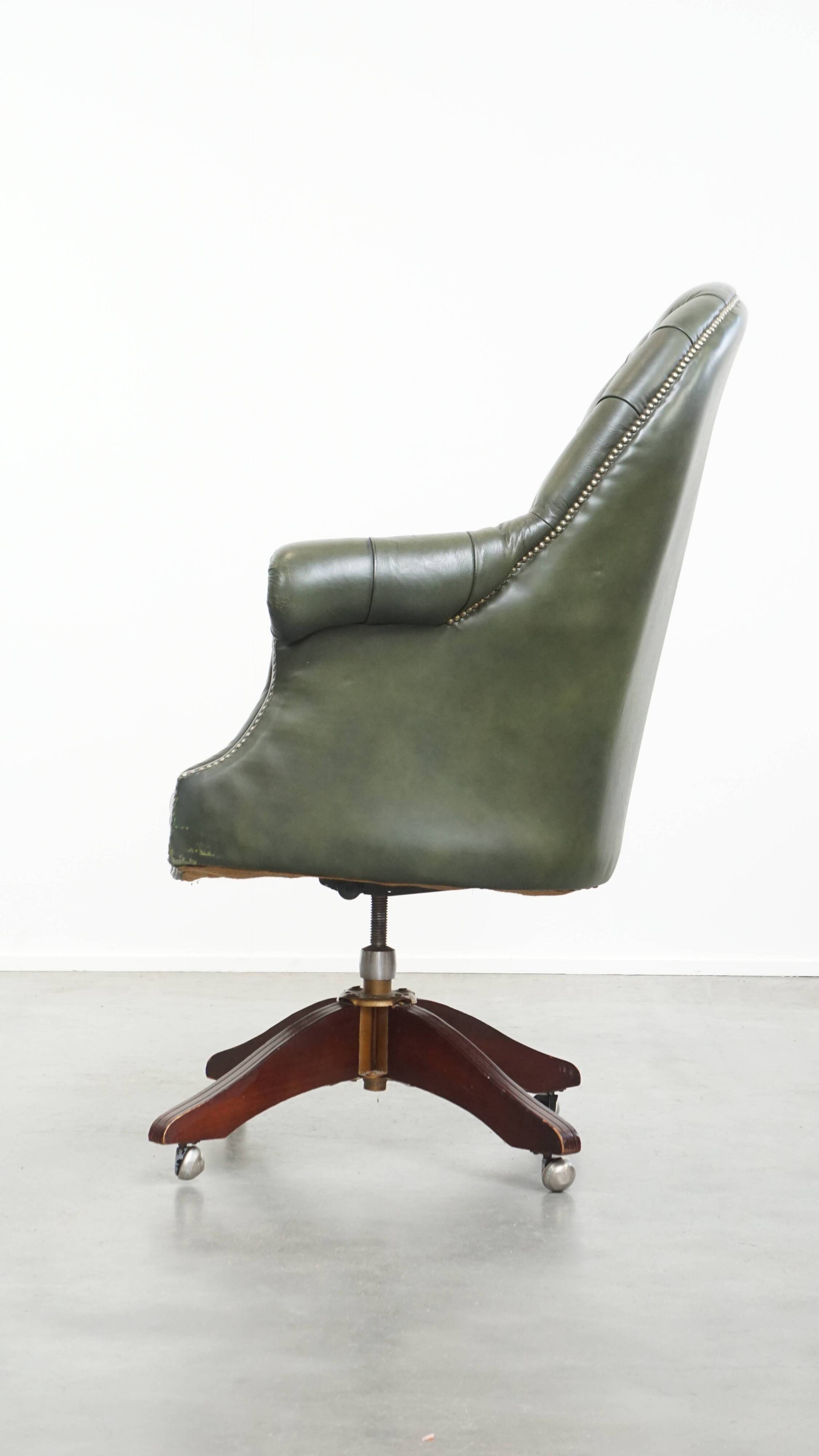 Chesterfield office chair in green cowhide leather on casters with high back