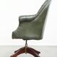 Chesterfield office chair in green cowhide leather on casters with high back