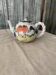 Vintage coloured ceramic jug in cream white with hand-painted decoration (Hungary)