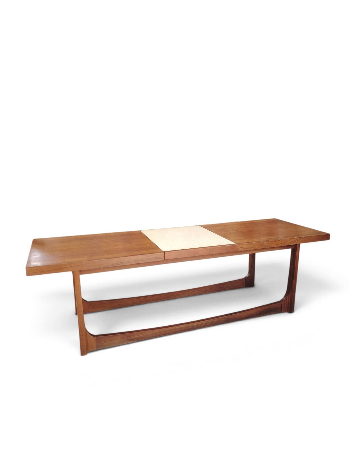 Vintage Scandinavian extendable coffee table with sled legs.