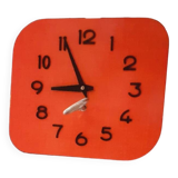 Vintage wall clock from the 50s in red formca